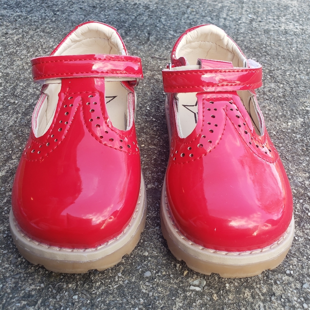 My baby Mary Janes red.